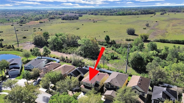 bird's eye view featuring a residential view and a water view