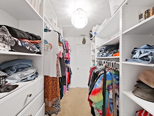 walk in closet with visible vents