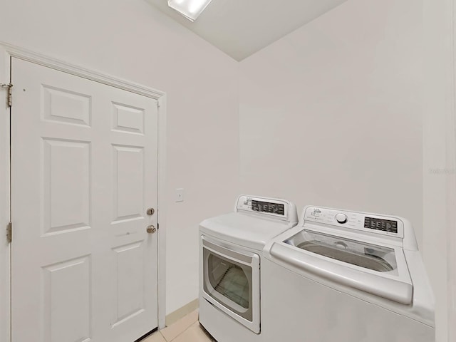 laundry room with laundry area and separate washer and dryer