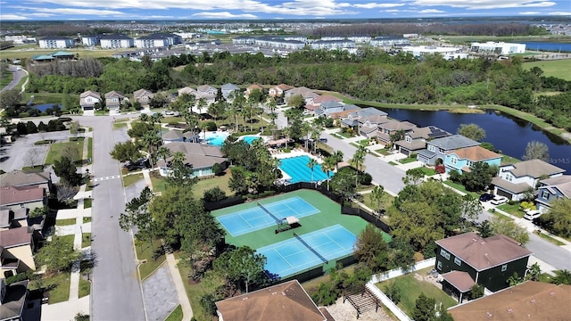 aerial view featuring a residential view and a water view