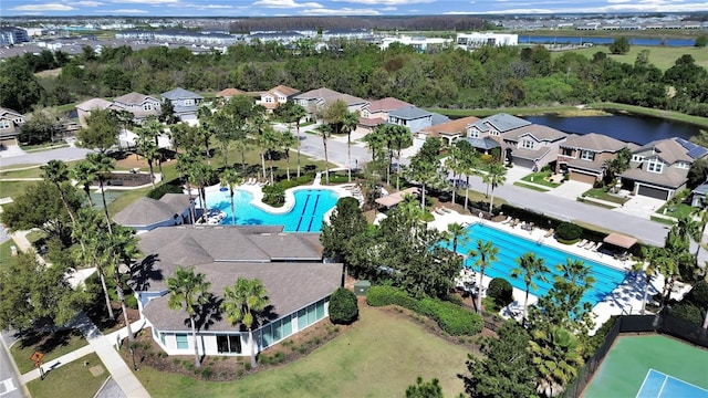 aerial view featuring a residential view and a water view