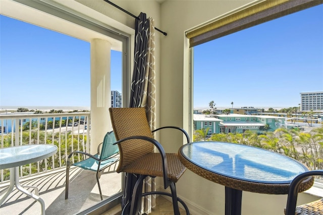 balcony featuring a city view