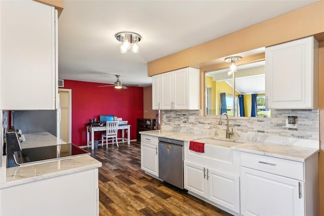 1021 Augusta Dr, Sun City Center, FL 33573 - kitchen with a ceiling fan, a sink, white cabinets, stainless steel dishwasher, and tasteful backsplash
