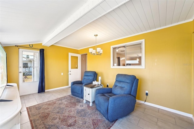 1021 Augusta Dr, Sun City Center, FL 33573 - sitting room featuring lofted ceiling with beams, crown molding, baseboards, and a chandelier