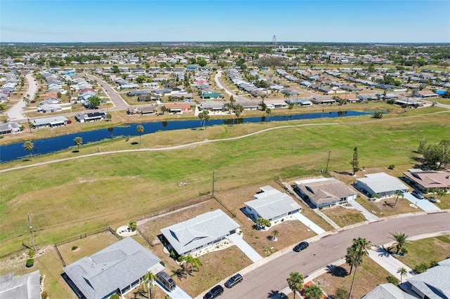 1021 Augusta Dr, Sun City Center, FL 33573 - birds eye view of property featuring a residential view and a water view
