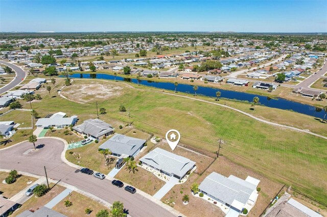 1021 Augusta Dr, Sun City Center, FL 33573 - aerial view with a residential view and a water view