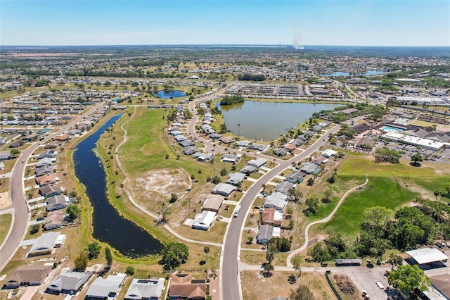 1021 Augusta Dr, Sun City Center, FL 33573 - drone / aerial view with a water view