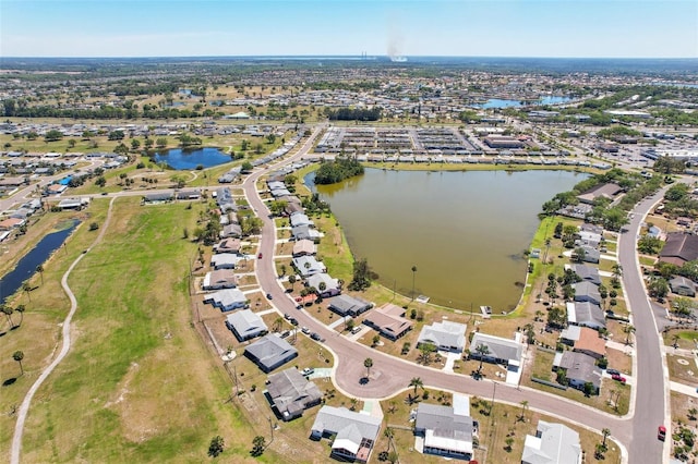1021 Augusta Dr, Sun City Center, FL 33573 - drone / aerial view featuring a water view