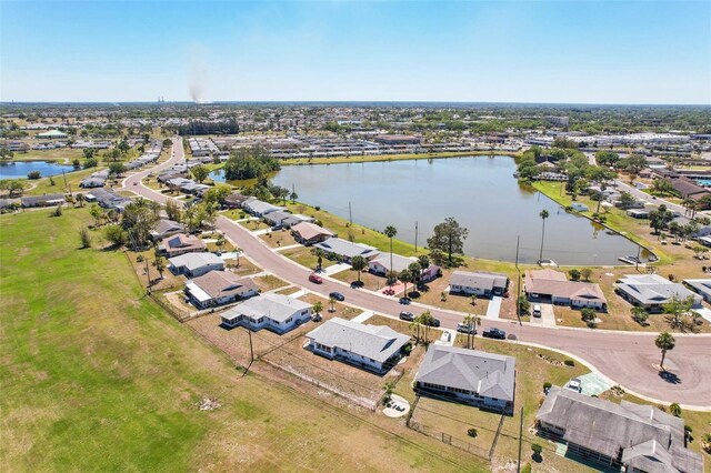 1021 Augusta Dr, Sun City Center, FL 33573 - birds eye view of property with a water view and a residential view