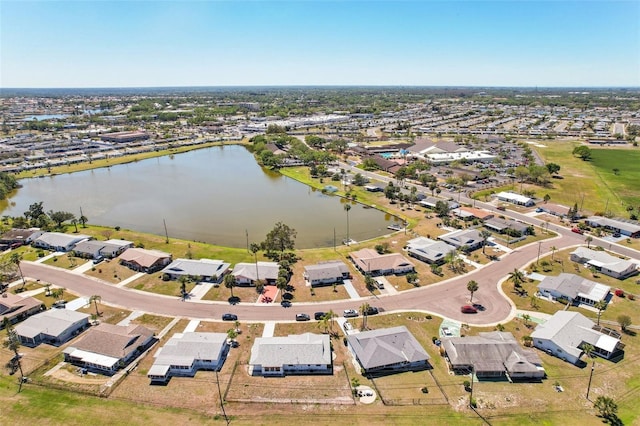 1021 Augusta Dr, Sun City Center, FL 33573 - drone / aerial view featuring a water view and a residential view