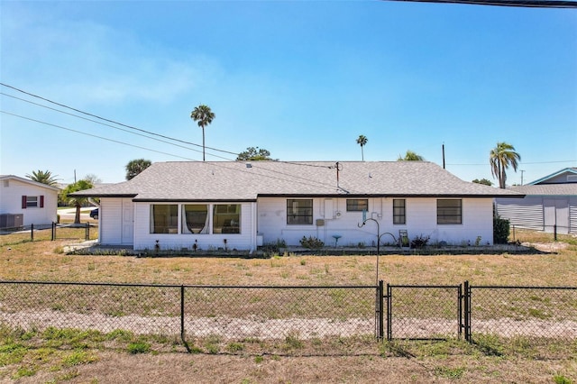 1021 Augusta Dr, Sun City Center, FL 33573 - ranch-style house with a gate, a front yard, and fence
