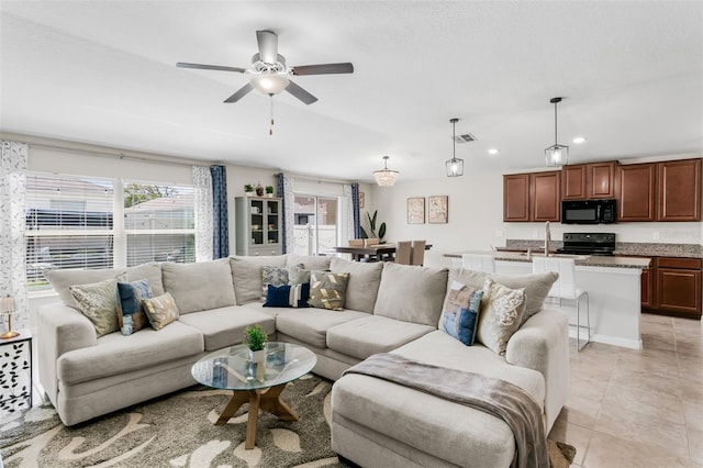 10105 Paradise Fish Dr, Riverview, FL 33578 - living area featuring light tile patterned floors, visible vents, recessed lighting, and ceiling fan