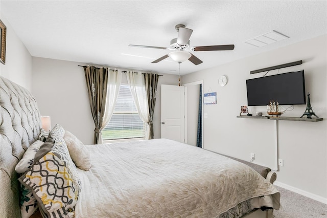 10105 Paradise Fish Dr, Riverview, FL 33578 - carpeted bedroom featuring visible vents, a textured ceiling, a ceiling fan, and baseboards