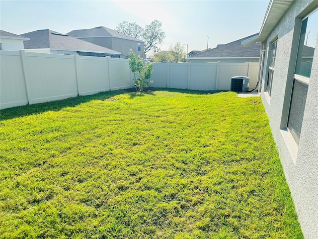 10105 Paradise Fish Dr, Riverview, FL 33578 - view of yard featuring cooling unit and a fenced backyard