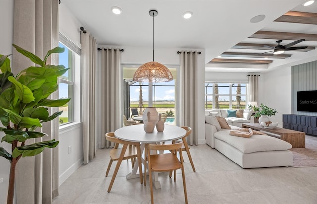 dining area with beam ceiling, a ceiling fan, coffered ceiling, recessed lighting, and baseboards