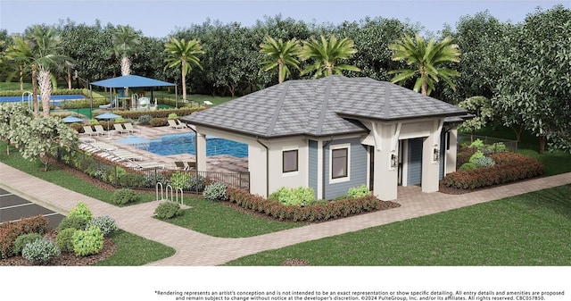 view of swimming pool featuring a patio area, a fenced in pool, and a yard