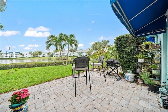 view of patio / terrace featuring a water view