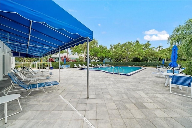 pool with a patio