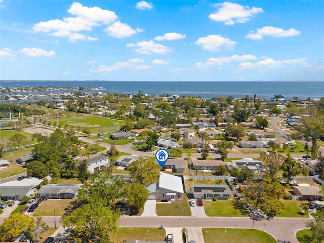 birds eye view of property featuring a residential view and a water view