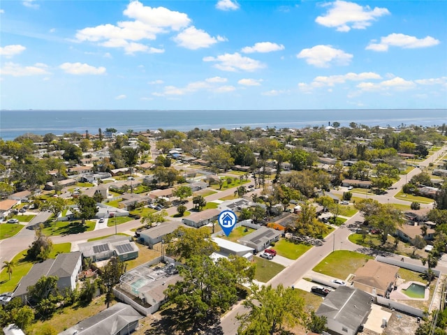 bird's eye view with a residential view and a water view