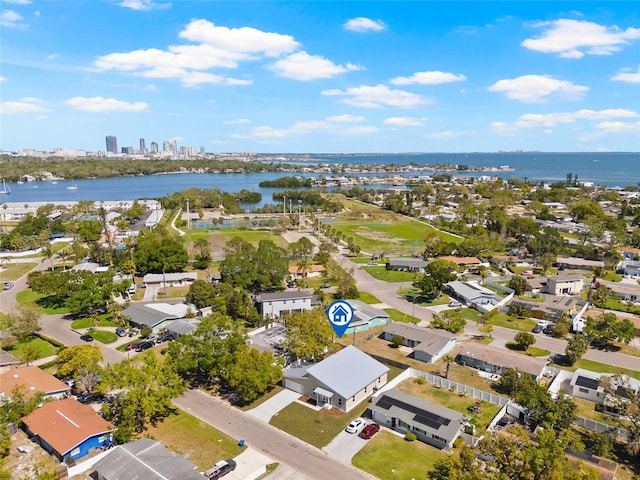 drone / aerial view with a view of city and a water view