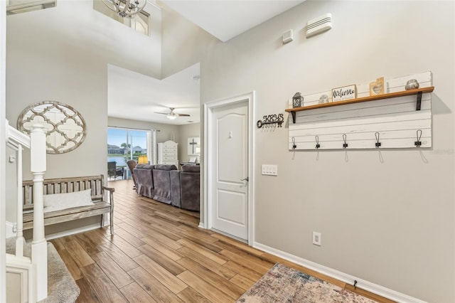 interior space with light wood finished floors and baseboards