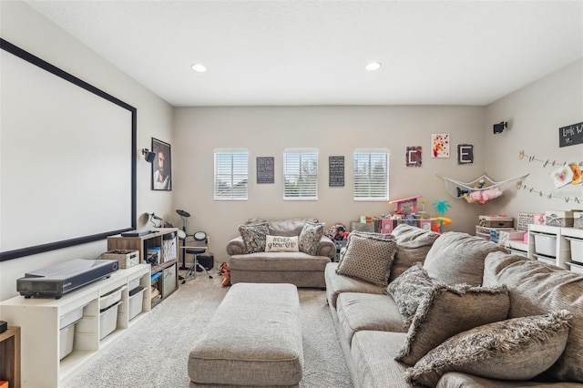 carpeted home theater room featuring recessed lighting