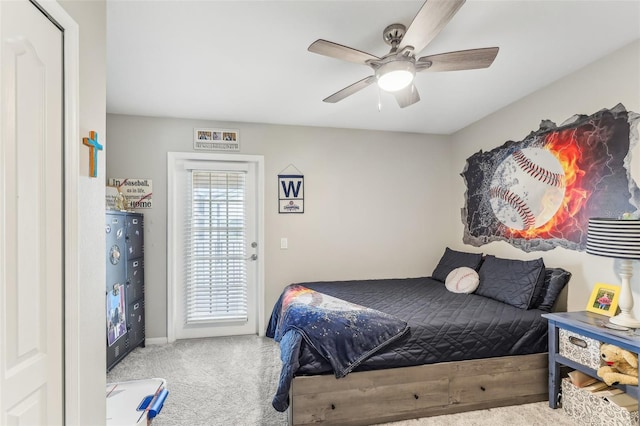 bedroom with carpet flooring, a ceiling fan, and access to outside