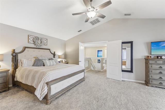 carpeted bedroom featuring visible vents, ceiling fan, baseboards, and lofted ceiling