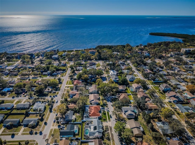 bird's eye view featuring a residential view and a water view