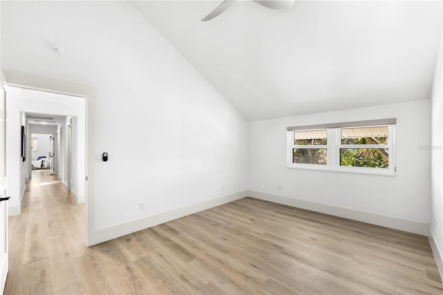 517 Belle Isle Ave, Belleair Beach, FL 33786 - bonus room with baseboards, lofted ceiling, light wood-style flooring, and ceiling fan