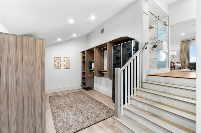 517 Belle Isle Ave, Belleair Beach, FL 33786 - stairs featuring wood finished floors, recessed lighting, baseboards, and visible vents