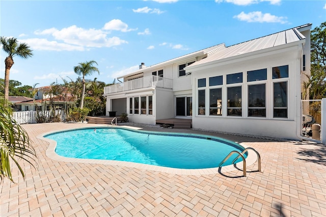 517 Belle Isle Ave, Belleair Beach, FL 33786 - outdoor pool featuring a patio and fence