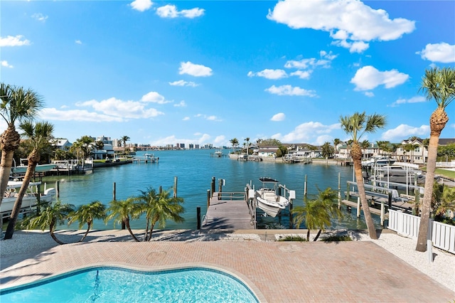 517 Belle Isle Ave, Belleair Beach, FL 33786 - outdoor pool featuring boat lift, a dock, and a water view