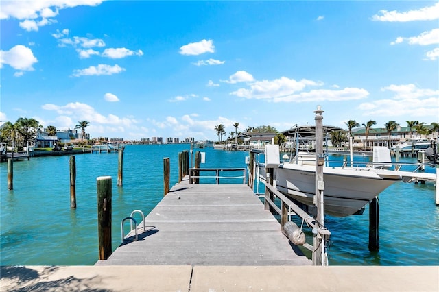 517 Belle Isle Ave, Belleair Beach, FL 33786 - dock area featuring boat lift and a water view