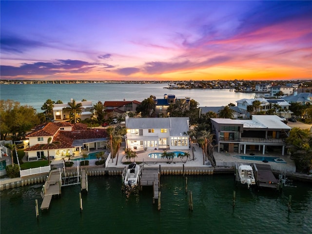 517 Belle Isle Ave, Belleair Beach, FL 33786 - birds eye view of property featuring a water view