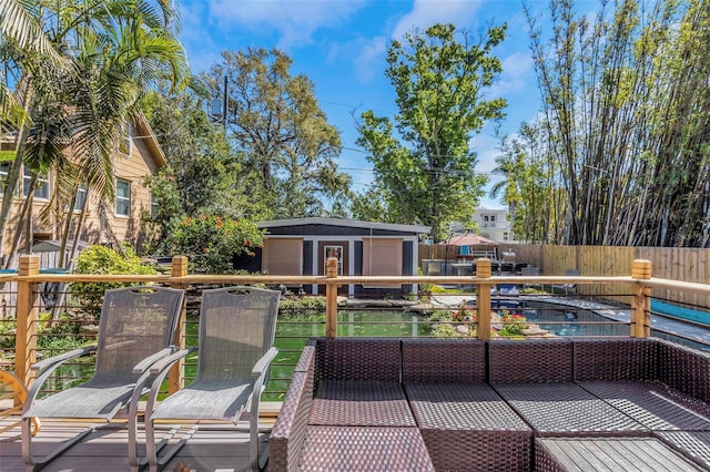 exterior space with an outdoor structure, fence, and a garage