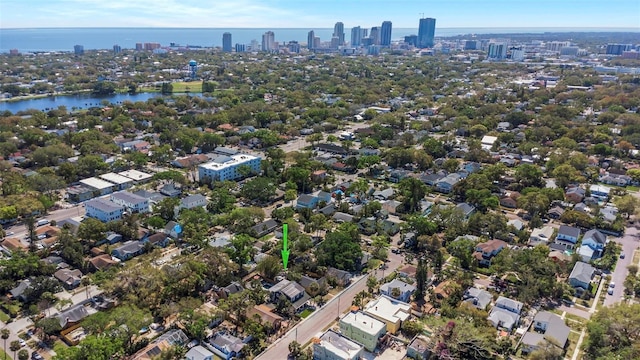 bird's eye view featuring a view of city and a water view