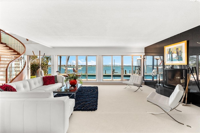 520 Belle Isle Ave, Belleair Beach, FL 33786 - carpeted living area featuring stairway