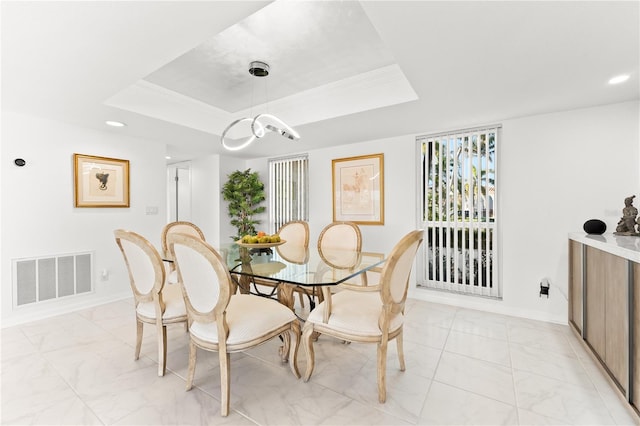 520 Belle Isle Ave, Belleair Beach, FL 33786 - dining room with visible vents, ornamental molding, recessed lighting, baseboards, and a raised ceiling