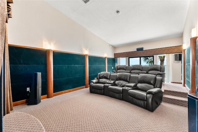 520 Belle Isle Ave, Belleair Beach, FL 33786 - carpeted home theater featuring baseboards and high vaulted ceiling