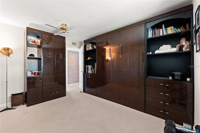 520 Belle Isle Ave, Belleair Beach, FL 33786 - bedroom with light carpet, visible vents, baseboards, and a ceiling fan