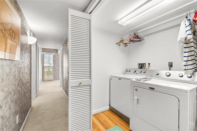 520 Belle Isle Ave, Belleair Beach, FL 33786 - clothes washing area with laundry area, washing machine and dryer, light colored carpet, and baseboards