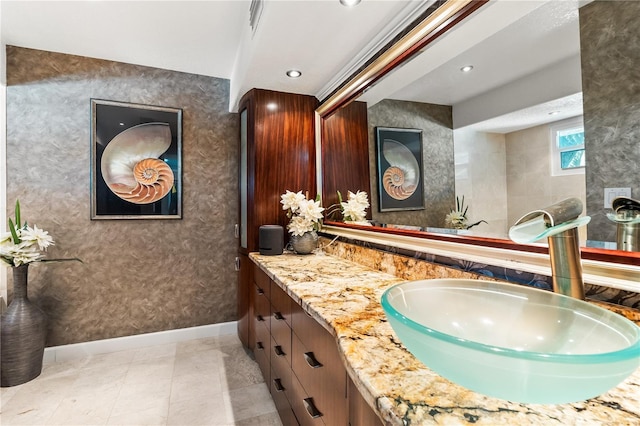 520 Belle Isle Ave, Belleair Beach, FL 33786 - bathroom with vanity, recessed lighting, and baseboards