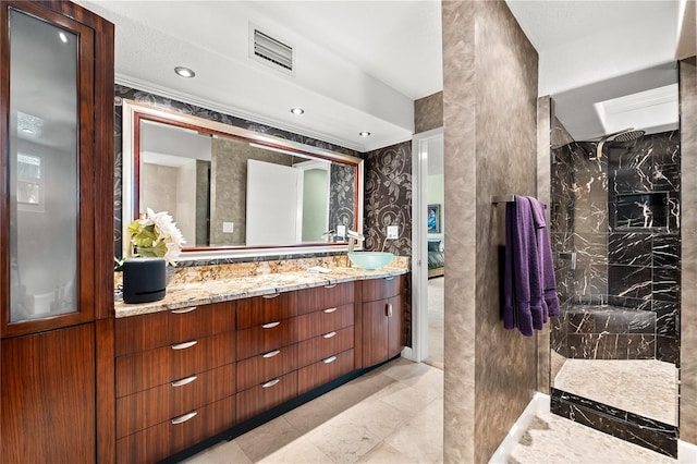 520 Belle Isle Ave, Belleair Beach, FL 33786 - full bath with vanity, visible vents, and a marble finish shower