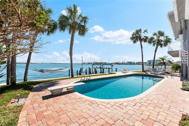520 Belle Isle Ave, Belleair Beach, FL 33786 - pool with a patio, a diving board, a dock, a water view, and boat lift
