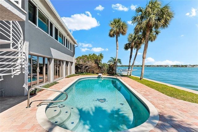 520 Belle Isle Ave, Belleair Beach, FL 33786 - outdoor pool with a patio and a water view