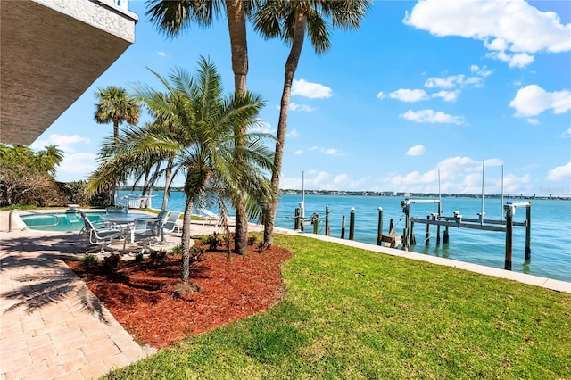 520 Belle Isle Ave, Belleair Beach, FL 33786 - dock area with a yard, a water view, and boat lift