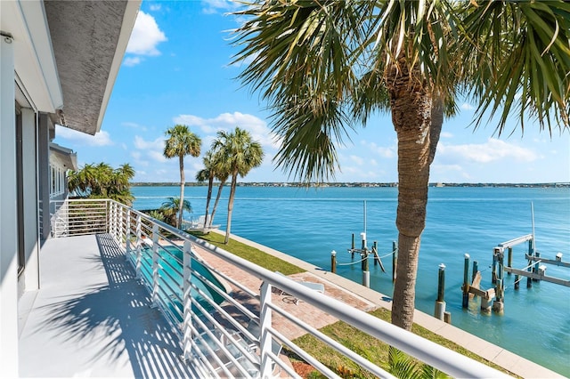 520 Belle Isle Ave, Belleair Beach, FL 33786 - balcony featuring a water view, boat lift, and a dock