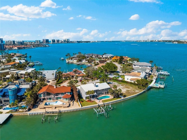520 Belle Isle Ave, Belleair Beach, FL 33786 - drone / aerial view with a water view and a city view